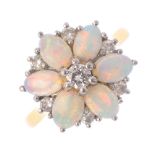 An 18ct gold opal and diamond floral dress ring. The brilliant-cut diamond, with oval opal