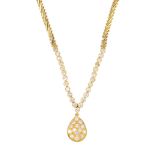 A diamond necklace. The pave-set diamond cluster, inset to the pear-shape panel, suspended from a