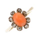 A coral and diamond cluster ring. The oval coral cabochon, within a rose-cut diamond surround.