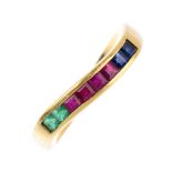 A ruby, sapphire and emerald ring. Designed as a series of square-shape sapphires, rubies and