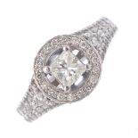 A diamond dress ring. The square-shape diamond, within a brilliant-cut diamond halo, with