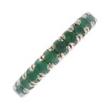 An emerald full-circle eternity ring. Designed as a circular-shape emerald line. Ring size M. Weight