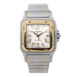 CARTIER - a Santos bracelet watch. Stainless steel case with yellow metal bezel. Reference 2319,