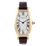 CARTIER - a Tonneau wrist watch. 18ct yellow gold case. Reference 2595E, serial 0220SM. Signed