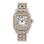 CARTIER - a Panthere bracelet watch. Stainless steel case with yellow metal bezel. Reference 166921,