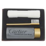 CARTIER - a jewellery cleaning kit. To inlcude a bottle of cleaning gel, a cloth and a brush. Box