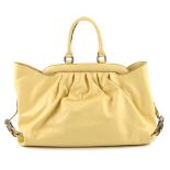 FENDI - a pale yellow leather Doctor B Frame handbag. Featuring a pale yellow leather exterior