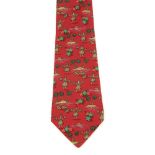 HERMÈS - a silk tie. Featuring a Hawaiian theme with hula dancers, palm trees and shells on a red