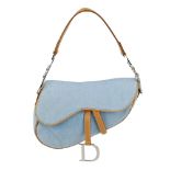 CHRISTIAN DIOR - a blue denim saddle handbag. Featuring a pale blue denim canvas exterior and