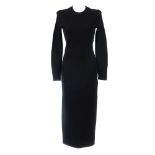 A designer dress and blouse. To include a Dries Van Noten full-length black wool dress and a sheer