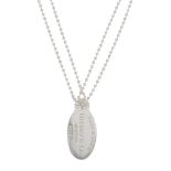 TIFFANY & CO. - a pendant. Designed as an oval-shape pendant stamped' Please Return To Tiffany & Co.