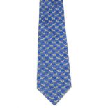 HERMÈS - a silk tie. Crafted from powder blue silk featuring a zebra and savannah tree motif with