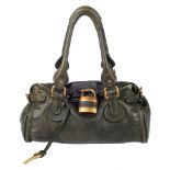 CHLOÉ - a green Paddington handbag. Featuring a green grained leather exterior, dual rolled