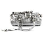 CHLOÉ - a metallic mini Paddington handbag. Featuring a grained silver leather exterior, dual rolled