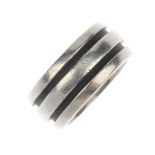 TIFFANY & CO. - an Atlas groove ring. Designed as a wide band with two oxidised grooves. Stamped