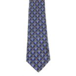 HERMÈS - a silk tie. Crafted from deep blue silk with an equestrian ribbon design strung on yellow