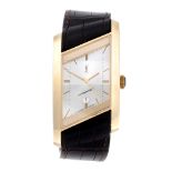 YVES SAINT LAURENT - a wrist watch. 18ct yellow gold case. Numbered 0707. Signed automatic