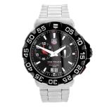 TAG HEUER - a gentleman's Formula 1 Alarm bracelet watch. Stainless steel case with calibrated