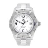 TAG HEUER - a gentleman's 2000 Exclusive bracelet watch. Stainless steel case with calibrated bezel.