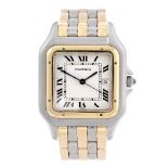 CARTIER - a Panthere bracelet watch. Stainless steel case with yellow metal bezel. Reference 183957,