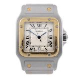 CARTIER - a Santos bracelet watch. Stainless steel case with yellow metal bezel. Reference 44155,