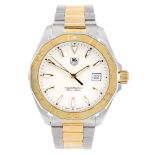 TAG HEUER - a gentleman's Aquaracer bracelet watch. Stainless steel case with gold plated calibrated