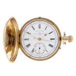 A full hunter chronograph pocket watch by Thomas Russell. 18ct yellow gold case with engraved