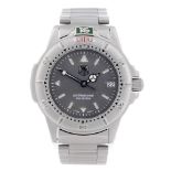 TAG HEUER - a mid-size 4000 Series bracelet watch. Stainless steel case with calibrated bezel.