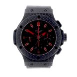 HUBLOT - a gentleman's Big Bang Red Magic Carbon chronograph wrist watch. Carbon fibre case with
