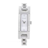 GUCCI - a lady's 3900L bracelet watch. Factory diamond set stainless steel case. Numbered 0305562.