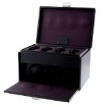 A Scatola del Tempo 7RT OS watch winder retailed by Asprey. Black leather covered case with
