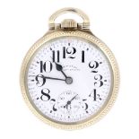 An open face railroad grade pocket watch by Hamilton. Rolled gold case. Numbered P154075. Signed