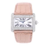 CARTIER - a Tank Divan wrist watch. Stainless steel diamond set case. Reference 2599, serial