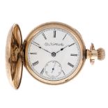 A full hunter pocket watch by Elgin Watch Co. Rolled gold case with foliate detail and old cut