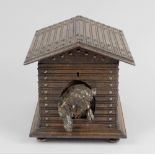 A Victorian novelty oak box modelled as a dog kennel, the hinged cover of apexed form above a