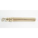 A 9ct gold Samson Mordan pencil, the grooved removable cover with suspension ring, enclosing a