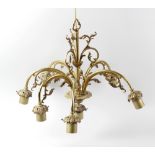 A box containing a pair of gilt metal six branch, seven light chandeliers, with cast scroll