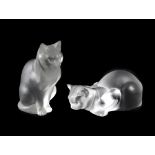 A pair of large Lalique glass cats. The first modelled in seated pose, 8.25, (21cm) high, the second