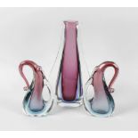 A garniture of three Venetian (Murano) glass vases. Each of teardrop form and clear on turquoise