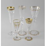 Five pairs of gilt-enriched champagne and wine glasses. Comprising three by Moser, two of these