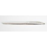 A Caran d'Ache for Patek Philippe ballpoint pen, the body with engine turned vertical decoration,