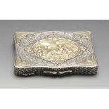 A continental snuff box, the shaped oblong form with central oval medallion with cherub scene within