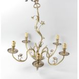 A box containing a gilt metal five branch chandelier with scrolled arms and applied gilt metal