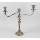 An antique Sheffield plate candelabra, the part reeded candlestick with removable three sconce