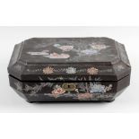 A Chinese inlaid black lacquer work box, the canted oblong body having hinged cover decorated with