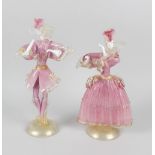 A pair of Murano pink and white mottled glass figures, modelled as a lady and dandy, with white