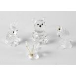 A box containing a selection of Swarovski 'silver crystal' glass figures and paperweights, to