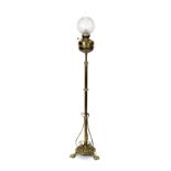 A Victorian brass column floor standing oil lamp, with brass reservoir, glass chimney and globular