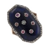 An early 19th century gold enamel and paste ring. The elongated octagonal blue enamel ring, with