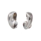 GEORG JENSEN - a pair of silver ear clips designed by Minas Spiridis. Of abstract curved design, the